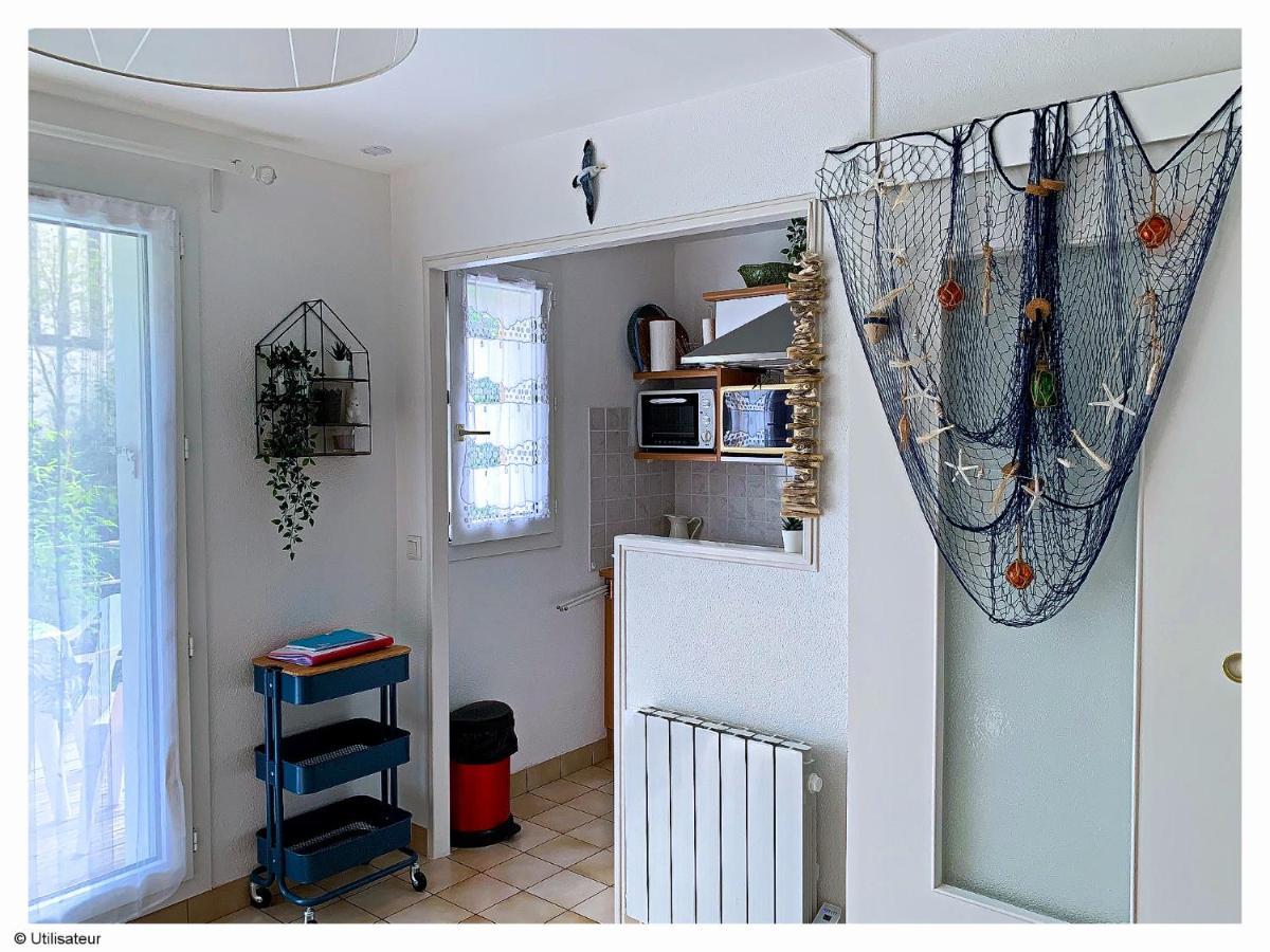 Cabourg, Appartement plain pied avec terrasse accès direct à la plage Esterno foto